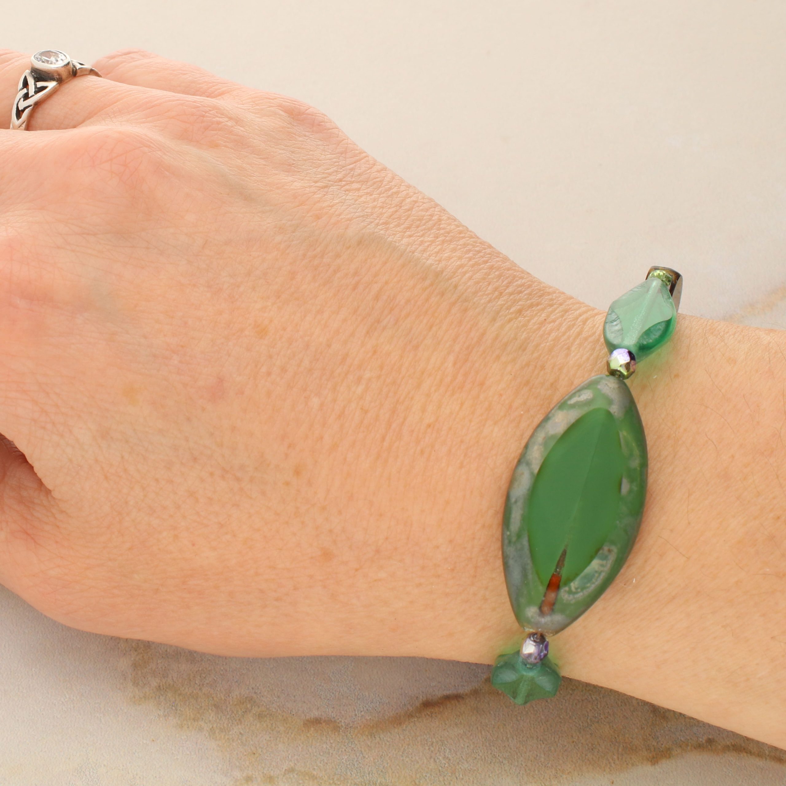 Smooth Green Czech Glass Oval Bead Mix by Bead Landing™ - Image 4